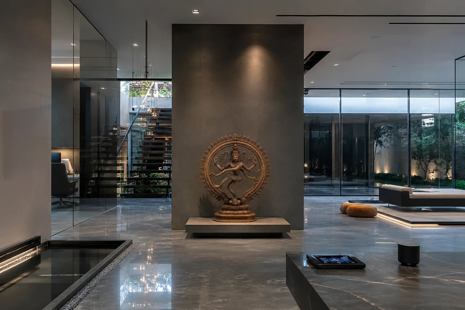 IVARA stone deity sculpture displayed on a dark timber cabinet in a warm-toned plaster corridor.